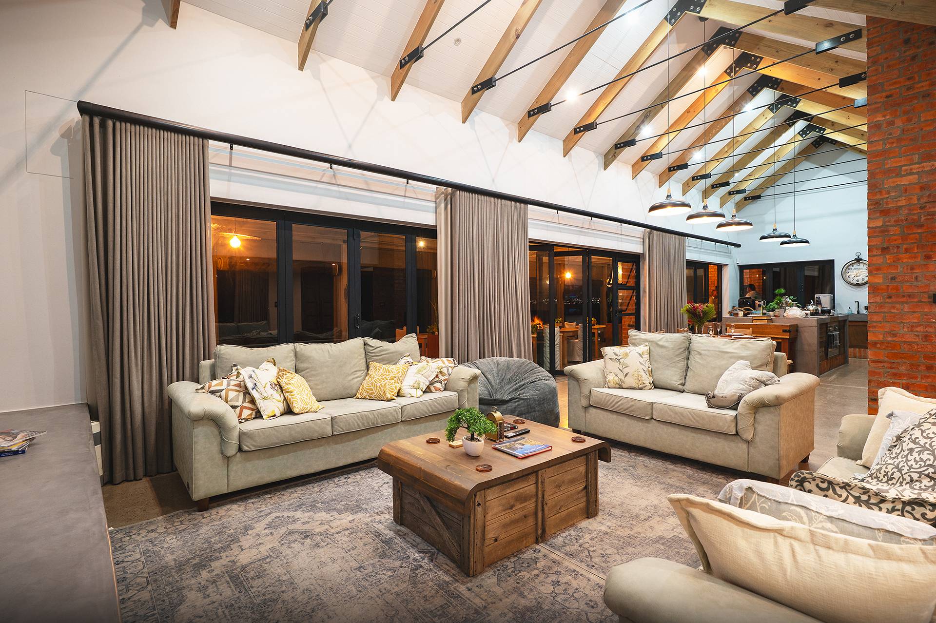 A spacious, well-lit lounge with a flatscreen TV and Netflix